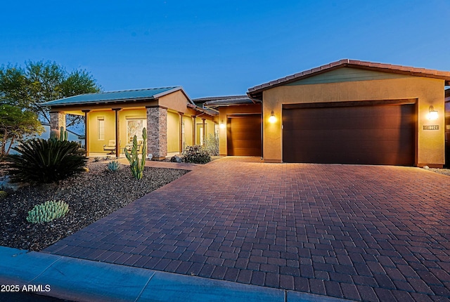 17249 E Fort Verde Rd, Rio Verde, AZ 85263 - ranch-style home with an attached garage, decorative driveway, and stucco siding