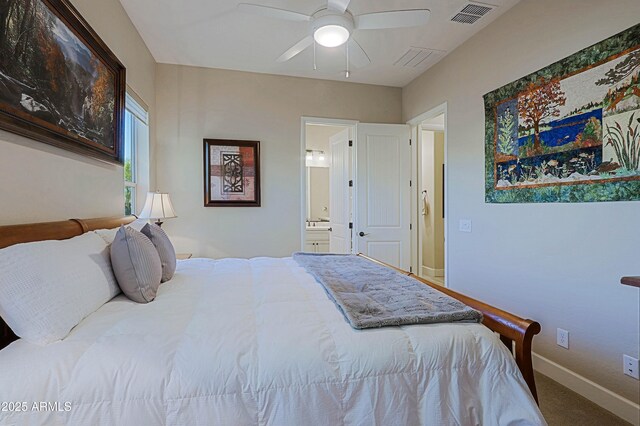 17249 E Fort Verde Rd, Rio Verde, AZ 85263 - bedroom featuring carpet flooring, baseboards, connected bathroom, and ceiling fan