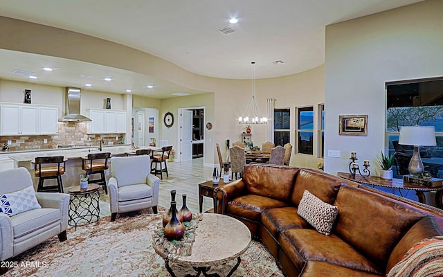 17249 E Fort Verde Rd, Rio Verde, AZ 85263 - living area with a chandelier, recessed lighting, and light wood finished floors