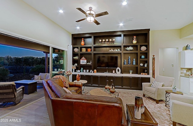 17249 E Fort Verde Rd, Rio Verde, AZ 85263 - living area featuring a ceiling fan, built in shelves, and recessed lighting