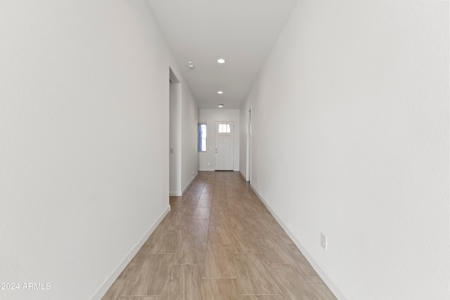 corridor featuring light wood-type flooring