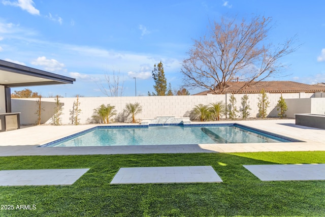 view of swimming pool featuring a fenced backyard, a fenced in pool, a lawn, and a patio