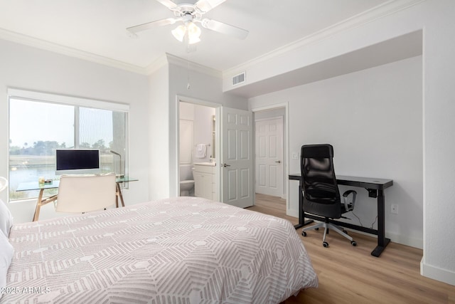 bedroom with ceiling fan, visible vents, baseboards, light wood finished floors, and crown molding