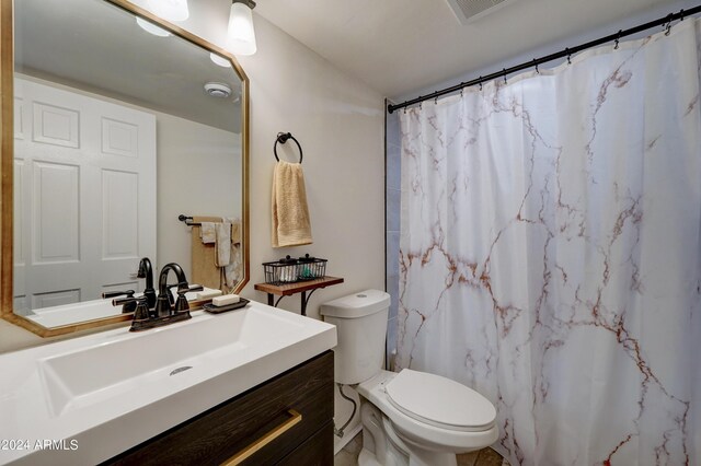 carpeted bedroom featuring a closet and ceiling fan