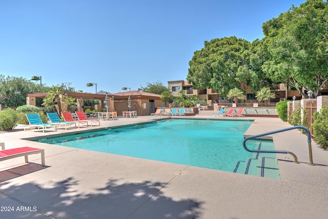 view of swimming pool featuring a patio