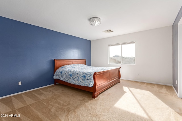 bedroom featuring carpet