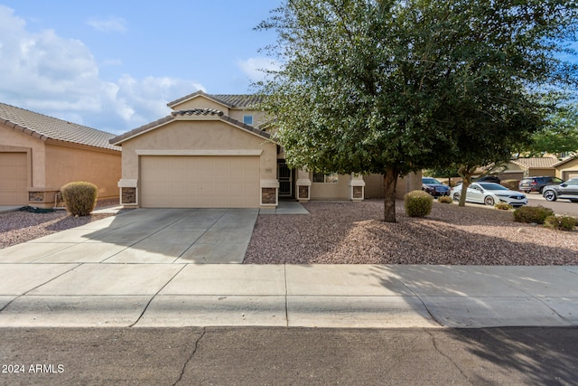 view of front of home with a garage