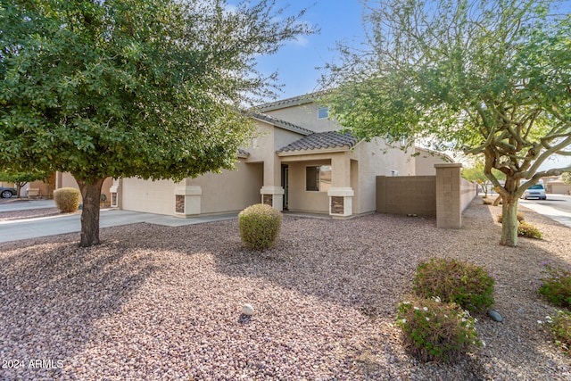 view of front of property with a garage