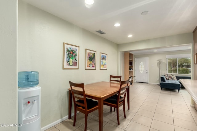 dining area with light tile patterned floors, baseboards, visible vents, and recessed lighting