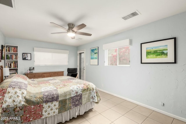 bedroom featuring visible vents, ceiling fan, baseboards, and light tile patterned floors