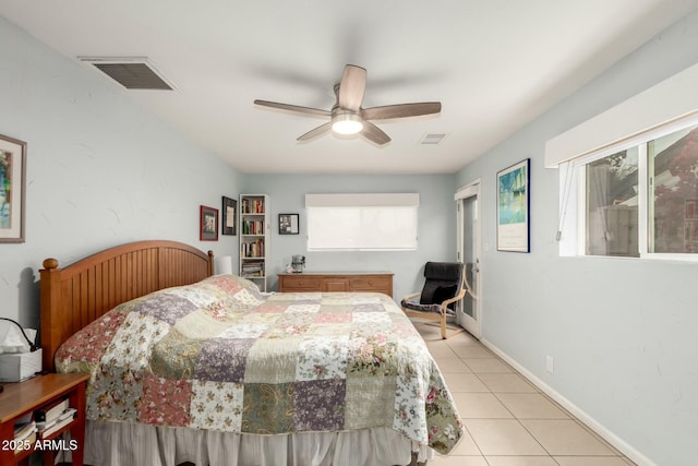 bedroom with ceiling fan, light tile patterned flooring, visible vents, and baseboards