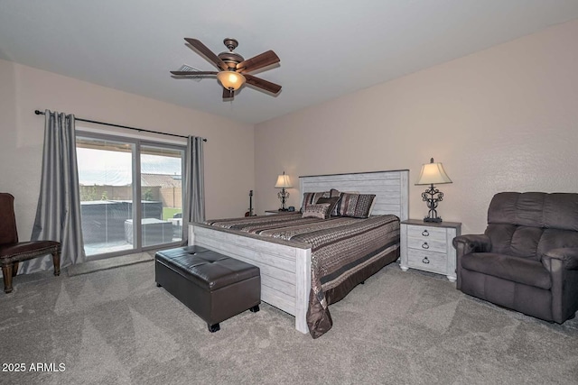 carpeted bedroom featuring ceiling fan and access to exterior