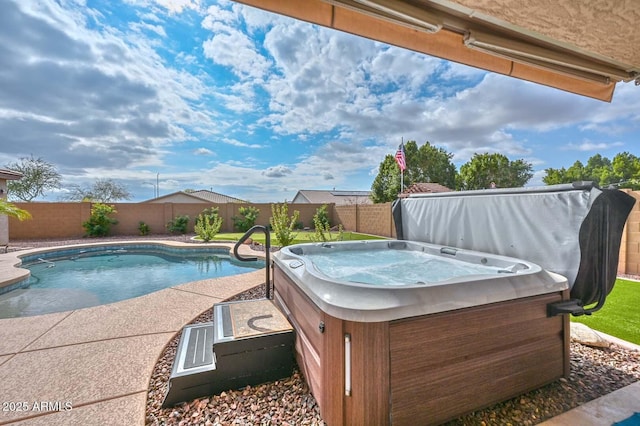 view of pool featuring a hot tub