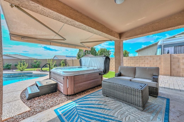 view of patio featuring a swimming pool with hot tub and an outdoor hangout area