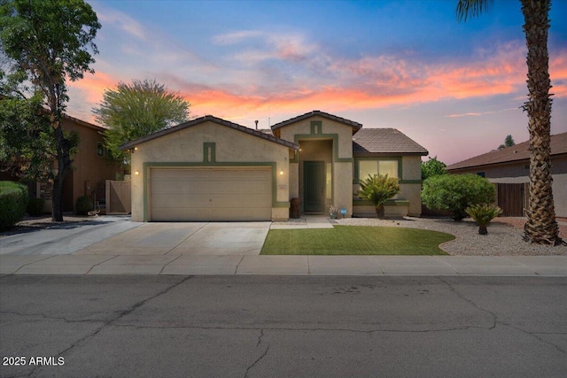 384 N Scott Dr, Chandler, AZ 85225 - view of front of property with driveway, a tiled roof, an attached garage, fence, and stucco siding