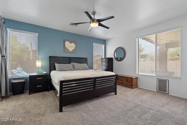 384 N Scott Dr, Chandler, AZ 85225 - bedroom with light carpet, a ceiling fan, multiple windows, and visible vents