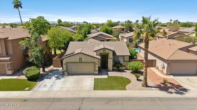 384 N Scott Dr, Chandler, AZ 85225 - view of front of property with fence, a residential view, stucco siding, concrete driveway, and a garage