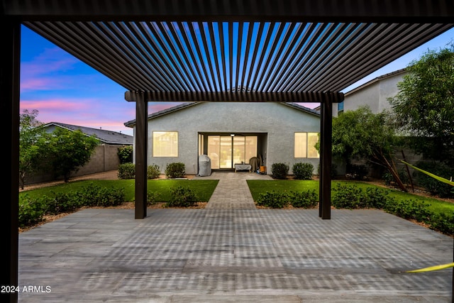 patio terrace at dusk with a yard