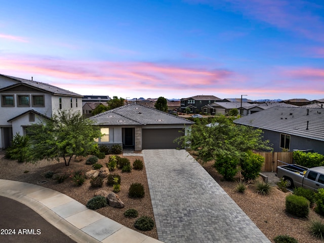 view of front of home with a garage