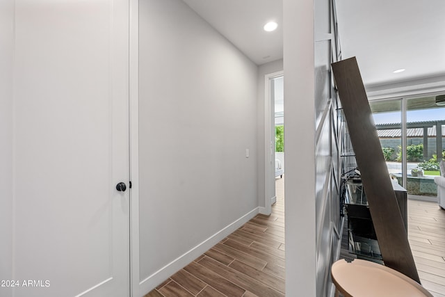 corridor featuring light hardwood / wood-style flooring