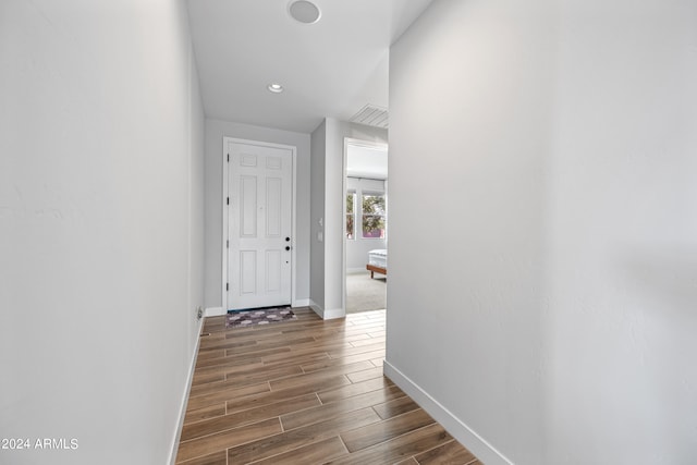 corridor featuring hardwood / wood-style flooring