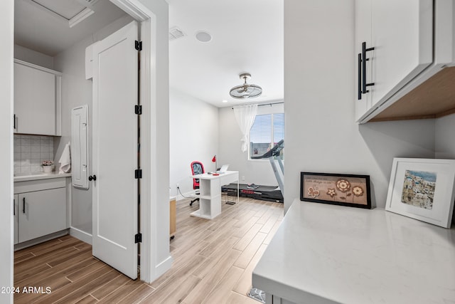 interior space with light hardwood / wood-style flooring