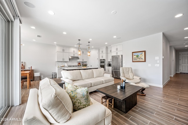 living room with hardwood / wood-style flooring