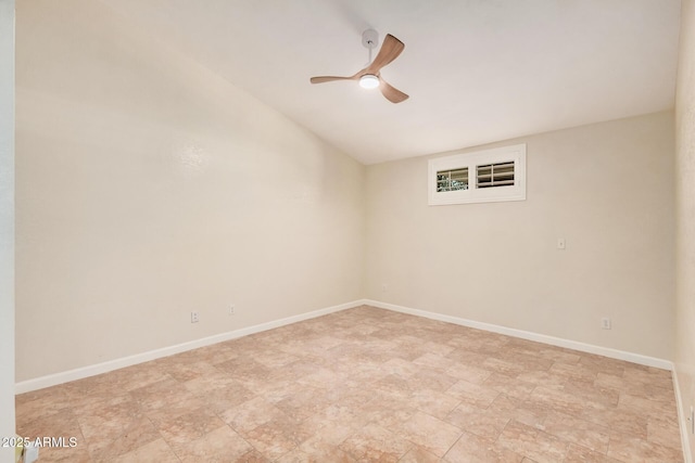 10244 N 65th Ln, Glendale, AZ 85302 - unfurnished room featuring vaulted ceiling, a ceiling fan, and baseboards