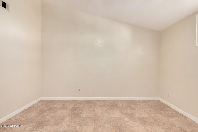 10244 N 65th Ln, Glendale, AZ 85302 - unfurnished room featuring baseboards