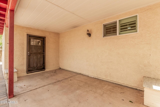 10244 N 65th Ln, Glendale, AZ 85302 - entrance to property with stucco siding and a patio