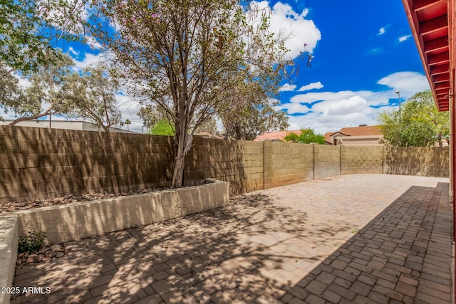 10244 N 65th Ln, Glendale, AZ 85302 - view of patio featuring a fenced backyard