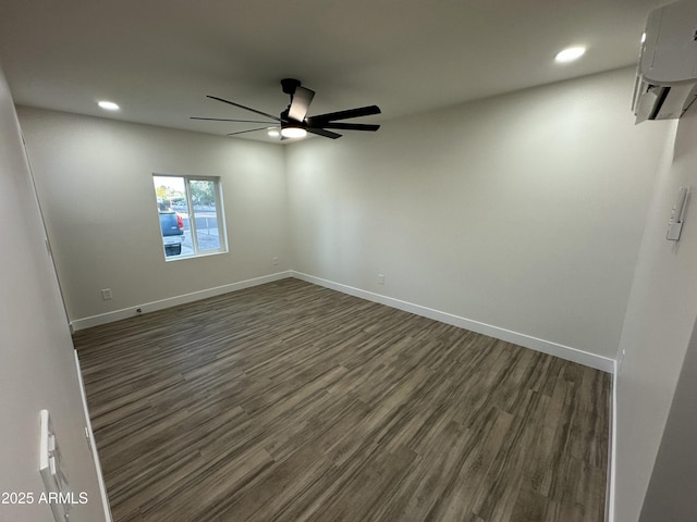 1930 W Missouri Ave, Phoenix, AZ 85015 - unfurnished room with a ceiling fan, recessed lighting, a wall unit AC, and dark wood-type flooring