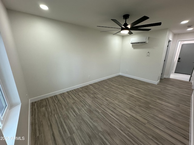 1930 W Missouri Ave, Phoenix, AZ 85015 - spare room featuring a wall mounted AC, dark wood finished floors, recessed lighting, and ceiling fan