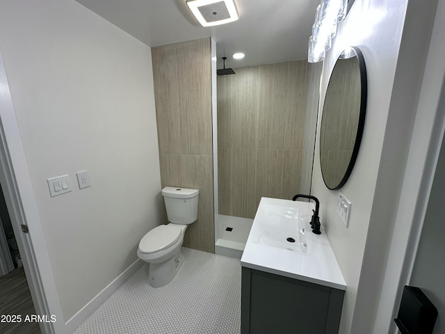 1930 W Missouri Ave, Phoenix, AZ 85015 - bathroom featuring vanity, tiled shower, and tile patterned flooring