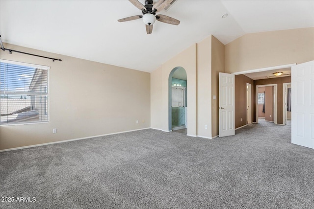 1520 E Flint St, Chandler, AZ 85225 - carpeted spare room featuring vaulted ceiling, arched walkways, a ceiling fan, and baseboards