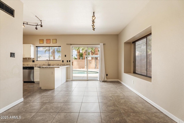 1520 E Flint St, Chandler, AZ 85225 - kitchen with a sink, track lighting, white cabinets, visible vents, and dishwasher
