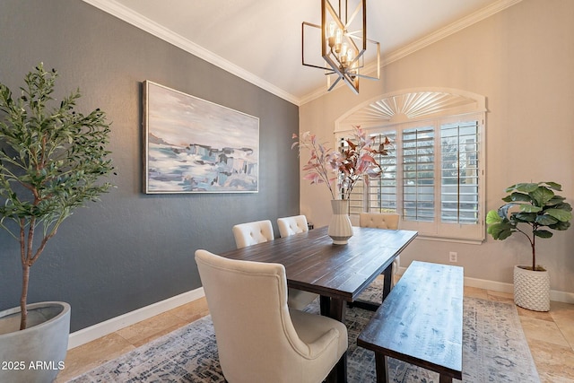 dining area featuring crown molding and a chandelier