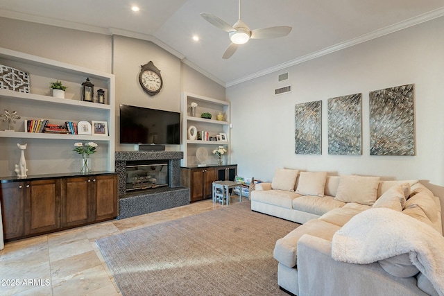 living room featuring crown molding, built in shelves, vaulted ceiling, and ceiling fan