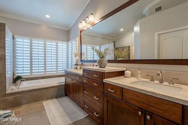 bathroom with tile patterned flooring, vanity, crown molding, and shower with separate bathtub