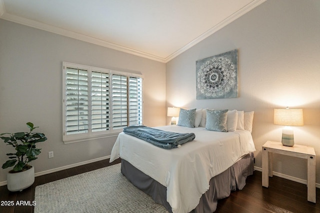 bedroom with crown molding, dark wood-type flooring, and vaulted ceiling