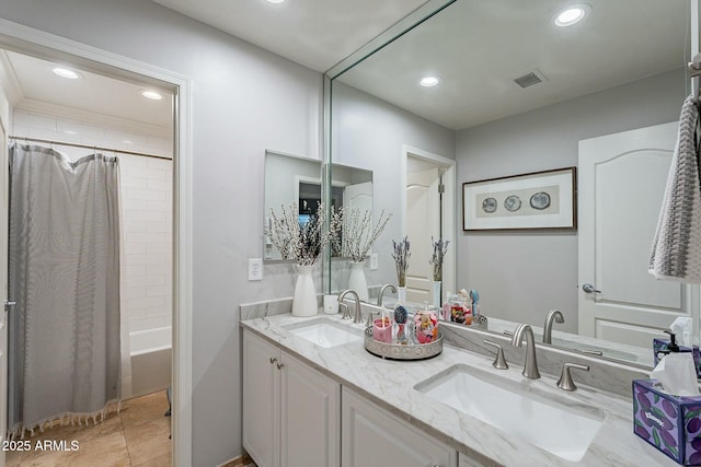 bathroom with vanity and shower / tub combo