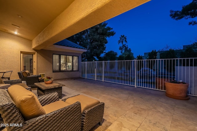 view of patio at night