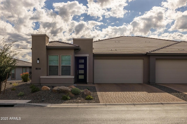 view of front of home with a garage