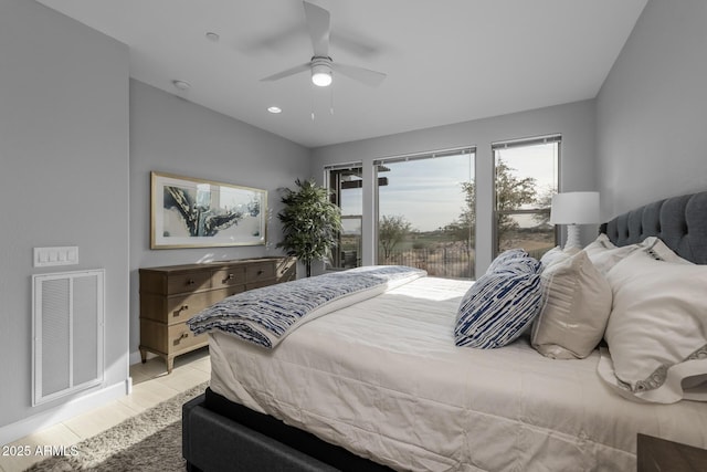 bedroom featuring ceiling fan, access to exterior, and light tile patterned floors