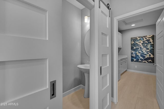 bathroom featuring hardwood / wood-style floors