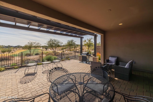 view of patio with a grill