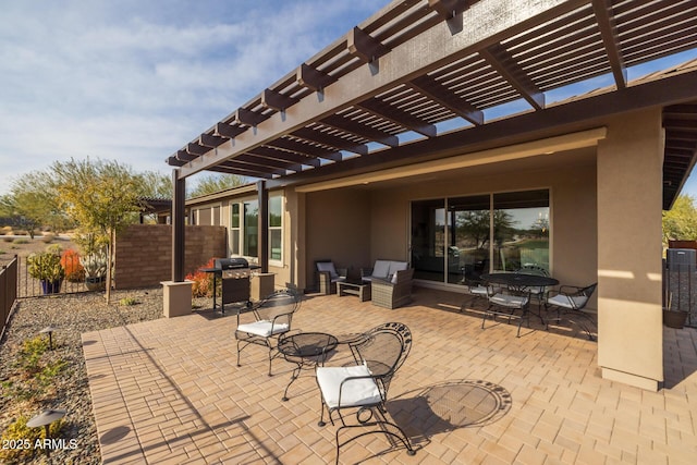 view of patio / terrace featuring a grill and a pergola