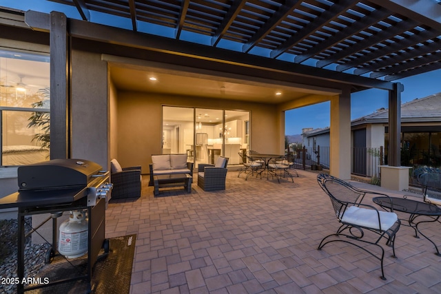 patio terrace at dusk with a grill, a pergola, and outdoor lounge area