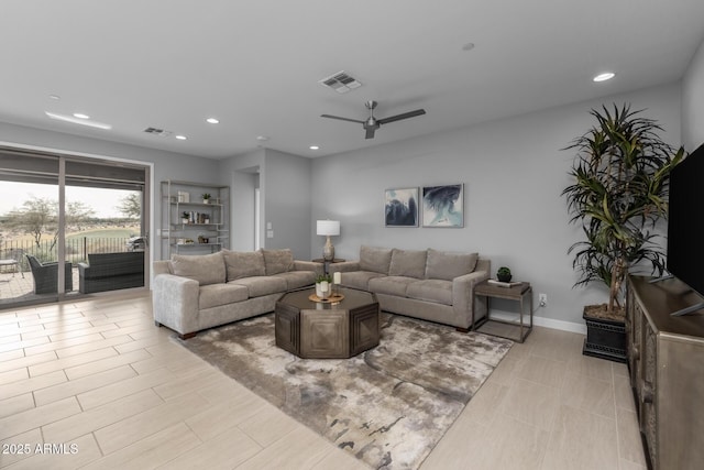 living room featuring ceiling fan