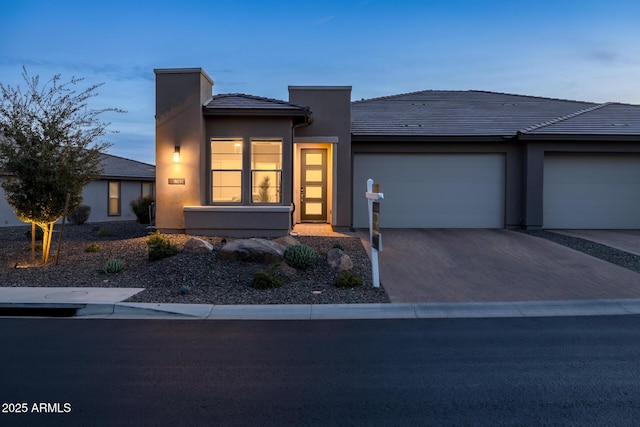 view of front of home with a garage